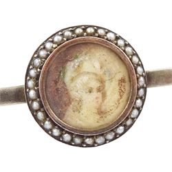 19th/ early 20th century silver portrait miniature jewellery including a pearl set pendant painted with a cherub, a ring painted with a young girl wearing a bonnet and brooch with seed pearl surround, all on ivory. This lot has been registered for sale under Section 10 of the APHA Ivory Act