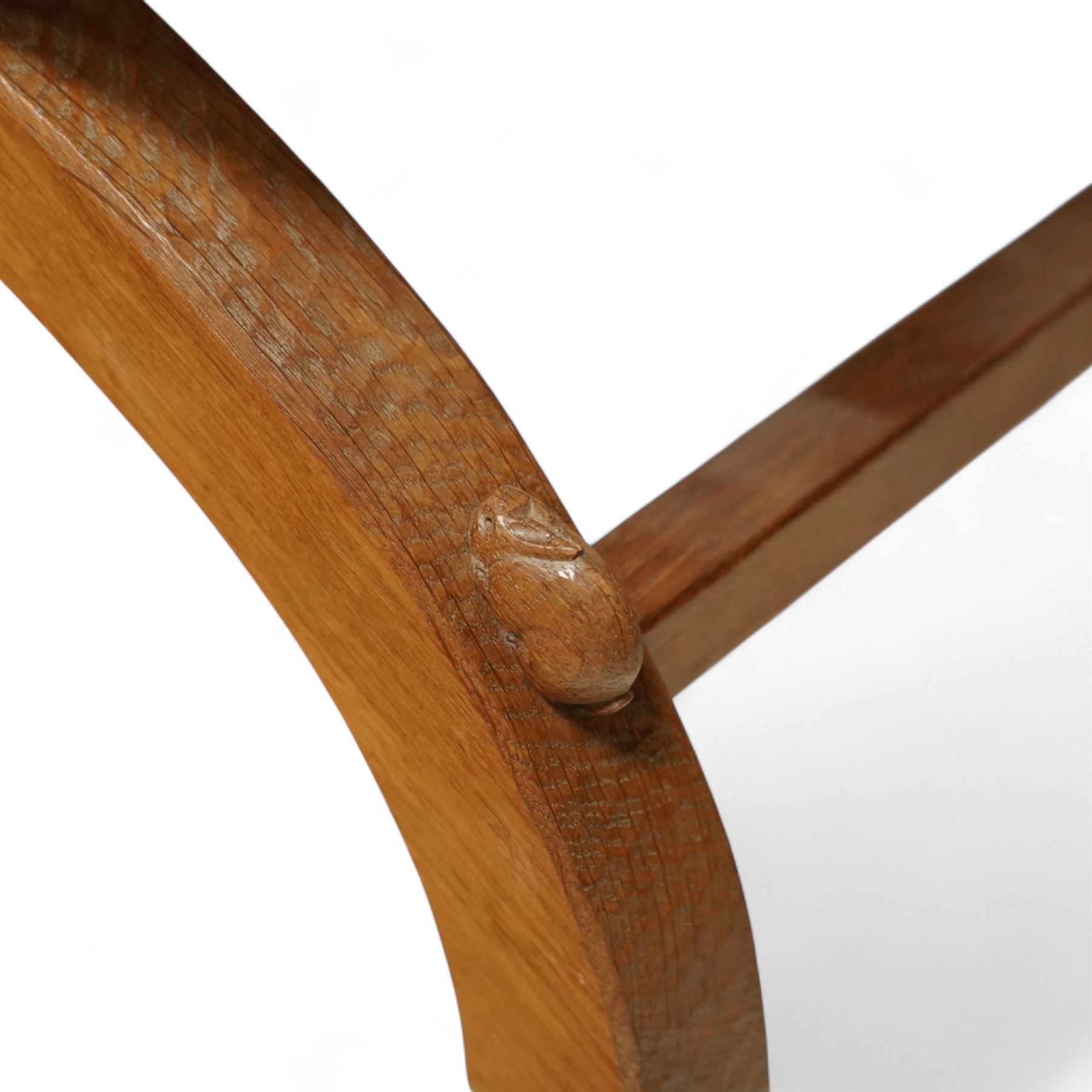 Rabbitman - curved x-framed stool with slung leather seats, adzed throughout the frame with signature Rabbit carving by Peter Heap of Wetwang