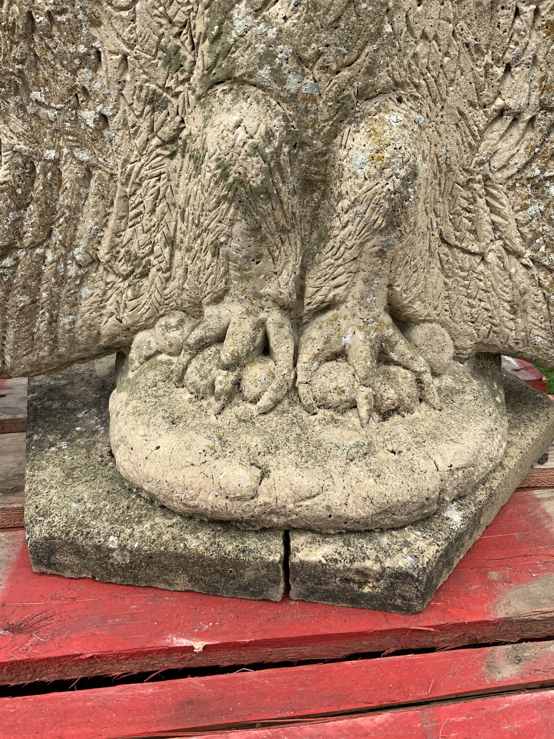 Pair composite stone perched eagle figures/gate post toppers with spread wings, on hexagonal slab base - THIS LOT IS TO BE COLLECTED BY APPOINTMENT FROM DUGGLEBY STORAGE, GREAT HILL, EASTFIELD, SCARBOROUGH, YO11 3TX