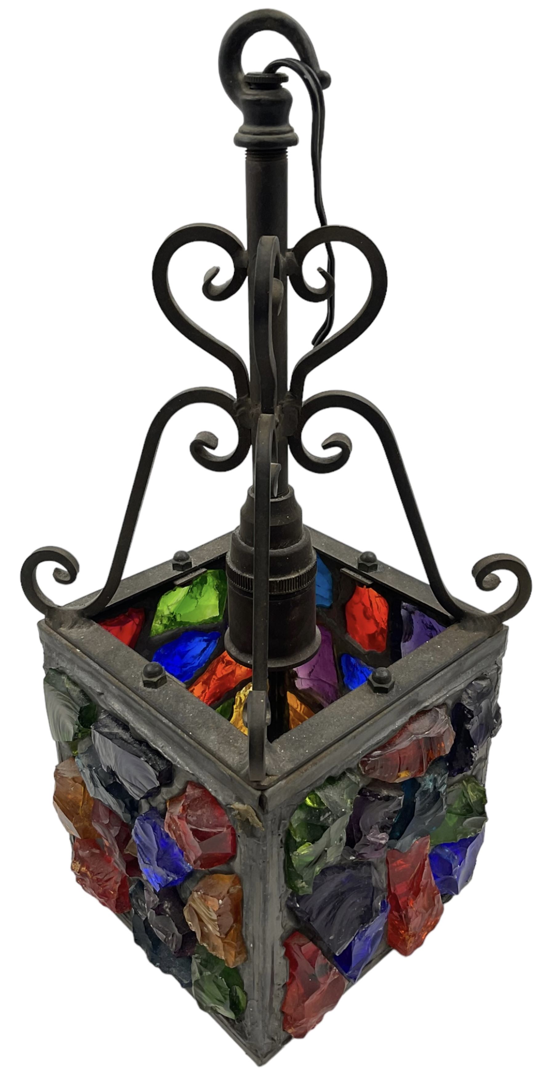 20th Century Peter Marsh Arts & Crafts wrought iron porch lantern, set with coloured panels, H36cm