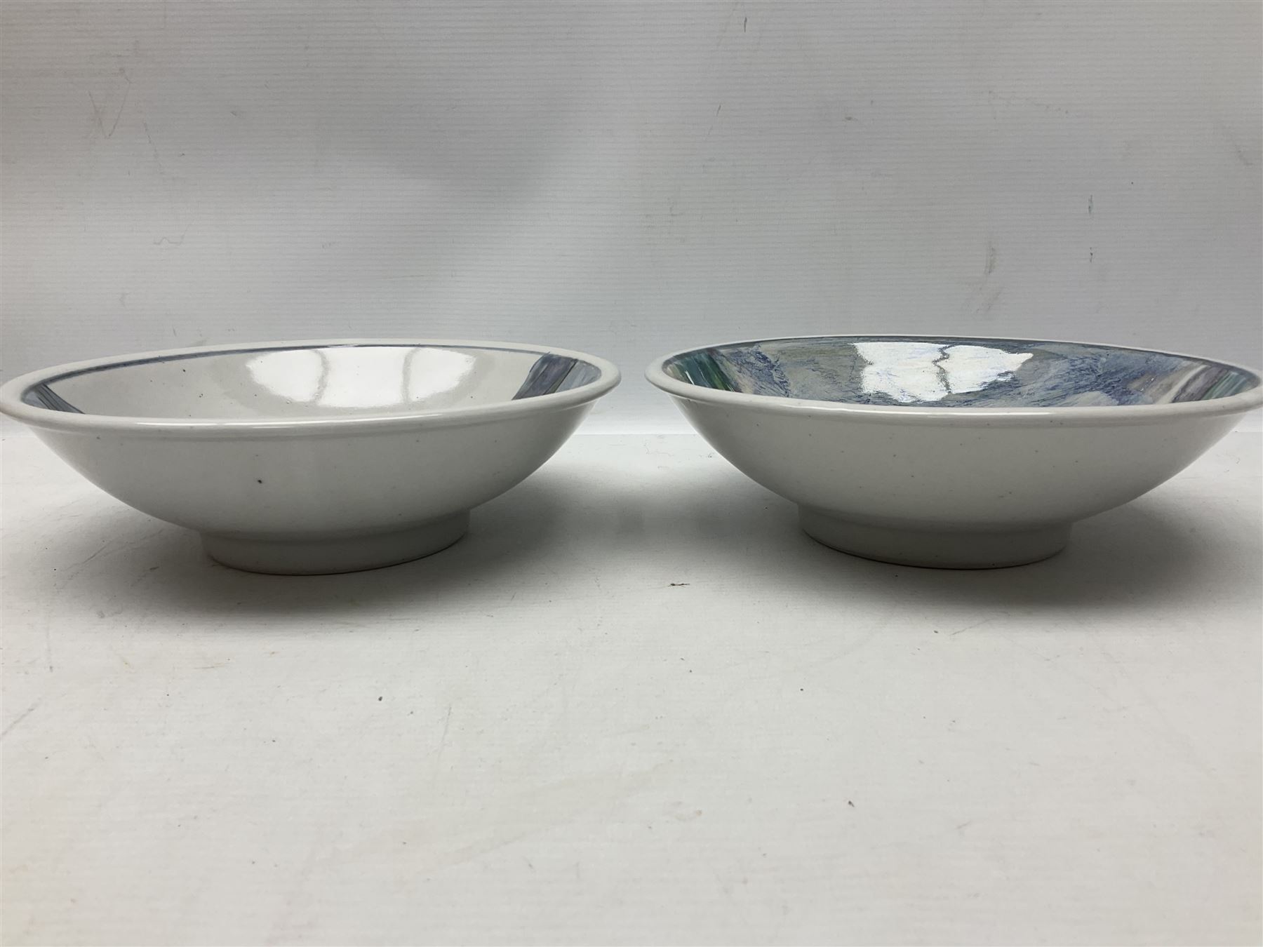 Highland Stoneware Scotland, decorated with landscapes and seascapes, comprising of two bowls, plate and two covered trinket boxes 