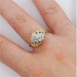 18ct gold round brilliant cut diamond cluster ring, with channel set diamond shoulders, hallmarked, total diamond weight approx 0.65 carat