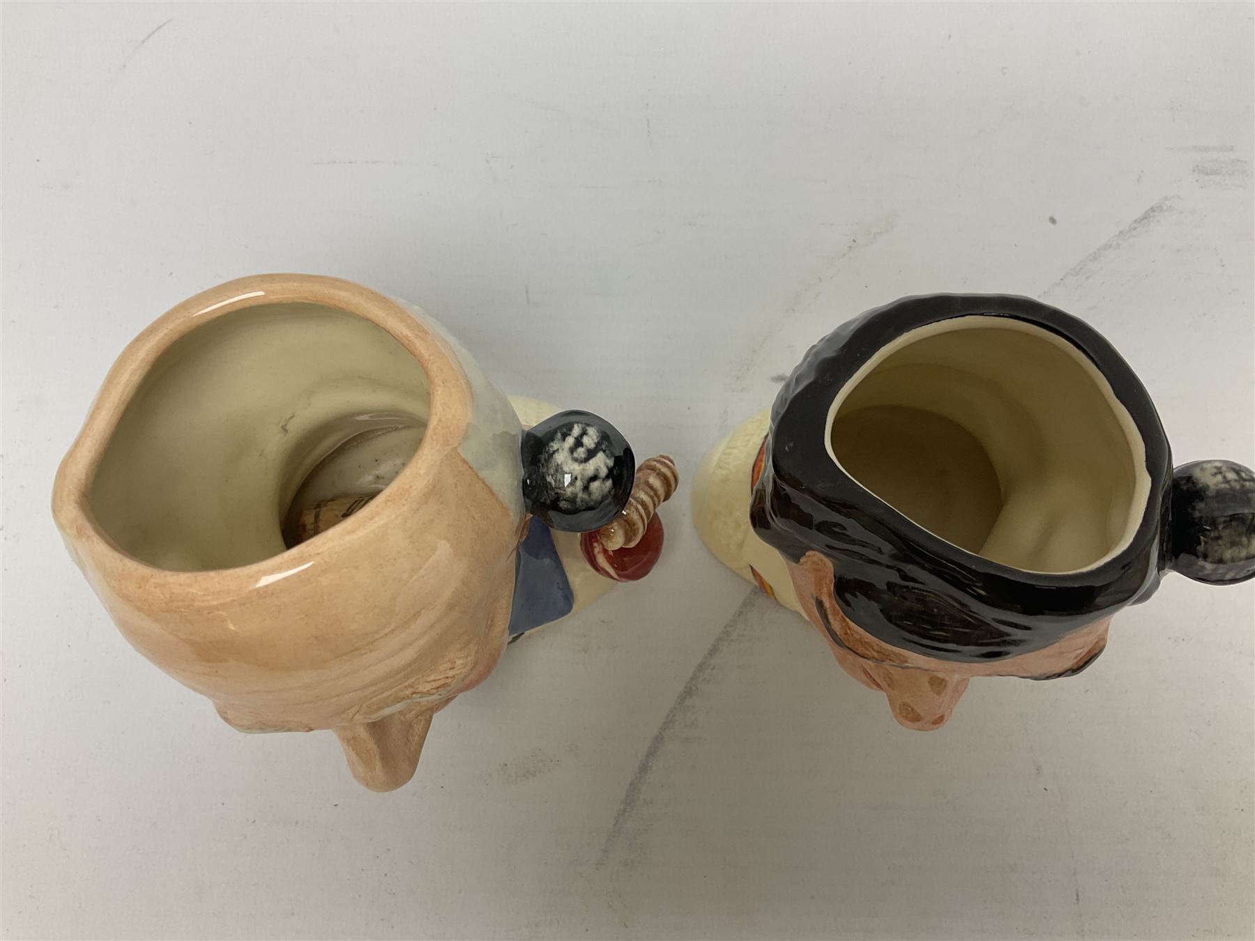 Royal Doulton limited edition figure of Geoffrey Boycott O.B.E, HN3890, no 253/8114, together with four Royal Doulton limited edition character jugs of cricket interest, comprising The Hampshire Cricketer D 6739, no 3903/5000, Freddie Trueman O.B.E, D 7090, no 502/9500, Brian Johnners Johnston, D 7018, no 1281/9500 and Len Hutton D 6945 no 263/9500, four with certificates, one with box