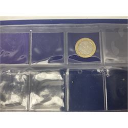Queen Elizabeth II fifty pence and two pound coins, most being commemoratives, including 1994 'D-Day', 1998 'NHS', 2006 'Victoria Cross', various relating to the London 2012 Olympics etc, face value approximately 76 GBP, housed in a ring binder folder