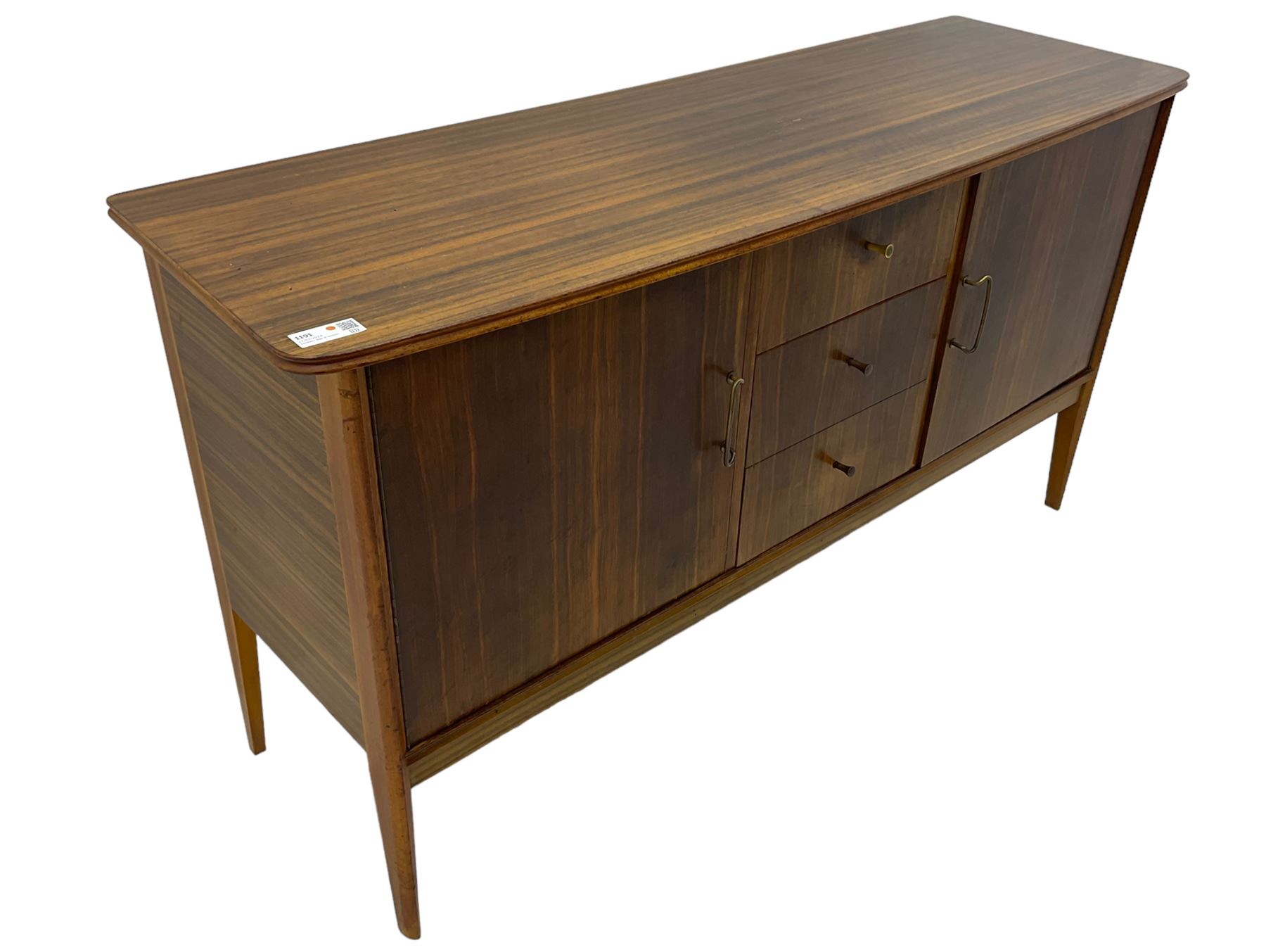 Peter Hayward for Vanson - mid-20th century teak sideboard, rectangular top with rounded corners over three central drawers, flanked by two cupboard doors enclosing shelves, raised on tapered supports