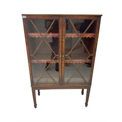19th century mahogany framed bookcase on stand, fitted with two astragal glazed doors enclosing two shelves over three drawers, raised on square tapering supports with spade feet. This item has been registered for sale under Section 10 of the APHA Ivory Act
