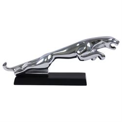 Reproduction chrome plate Jaguar car mascot upon a rectangular stand, L30cm