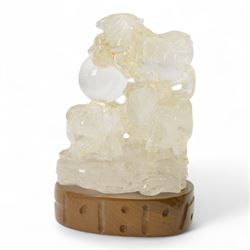 Chinses quartz carved figure group, modelled as three temple lions around a ball, upon an oval base, H20cm