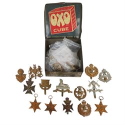 WWII seven British medals, comprising two War medals, two 1939-45 stars, African star, Italy star and French and German star, together with a collection of cap badges including The Kings Royal Rifles, Royal Engineers, East Lancashire, York and Lancaster regiment museum etc  