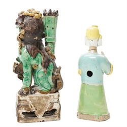 Chinese Kangxi period sancai glazed joss-stick holder, modelled as a dog of Foo, H21cm; and another figure, H18cm (2)