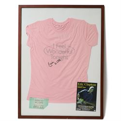 Signed Eric Clapton 2006 tour t-shirt, pink t-shirt with 'I Feel Wonderful Tonight' in sil...