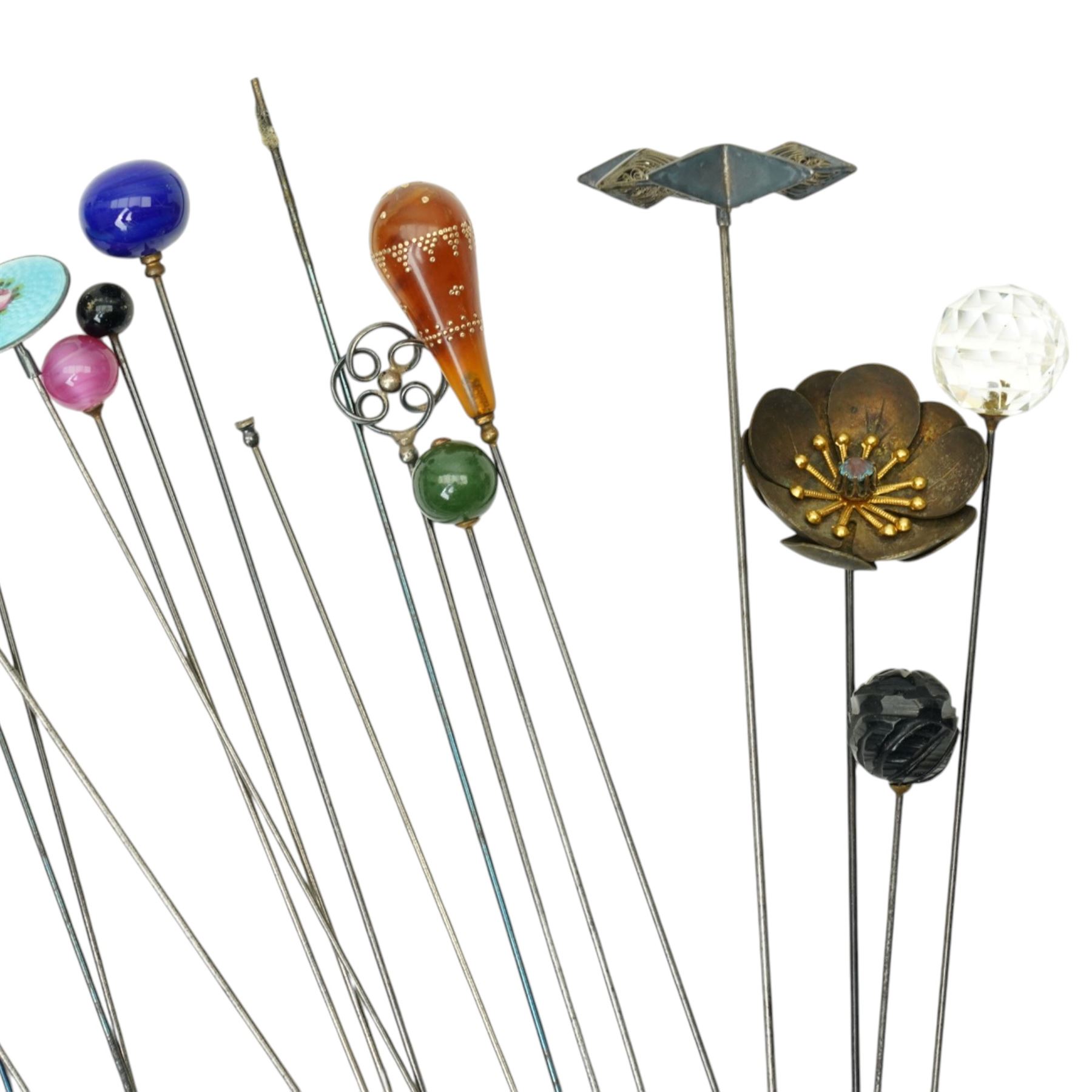 Collection of early 20th century and later hat pins including six silver mounted examples by Charles Horner, pique work, faceted class, jet acorn, filigree etc