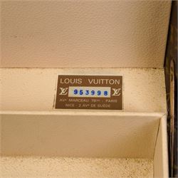 Mid-20th century Louis Vuitton monogram cabin trunk,  monogram canvas with lozine trim and brass mounts, single front leather handle with lock stamped Louis Vuitton with key code 1080701, the interior fitted with original webbing straps and lift-out tray, label to lid printed 'Avenue Marceau 78bis - Paris Nice - 2 Avenue de Suède' serial number 953998, circa1960s, with original key present
