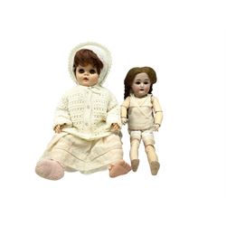 Simon & Halbig for Kammer & Reinhardt bisque head doll with applied hair, sleeping eyes, open mouth with teeth and composition body with jointed limbs H53cm; a hard plastic doll; and a boxed Corinthian 21 bagatelle board (3)