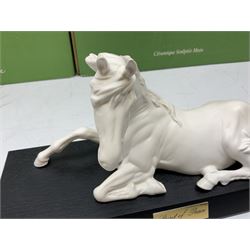 Five Beswick and Royal Doulton horse figures in matt white on black plinths, comprising of  Spirit of Affection no. 2689/2536, Springtime no.2837, Spirit of peace no.2916, Spirit of earth no.2914 and Spirit of the wild no. 183, together with a composite figure of a horse (6)