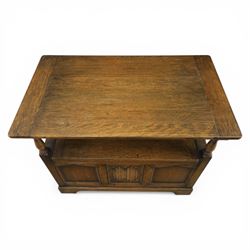 20th century oak monks bench with hinged box seat, with blind fretwork to the seat, panelled front and sides with linen fold panel in the centre