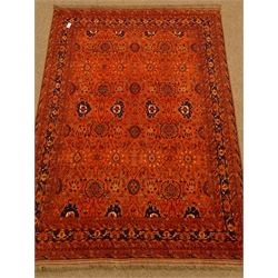  Persian red ground rug, repeating border, 294cm x 201cm  