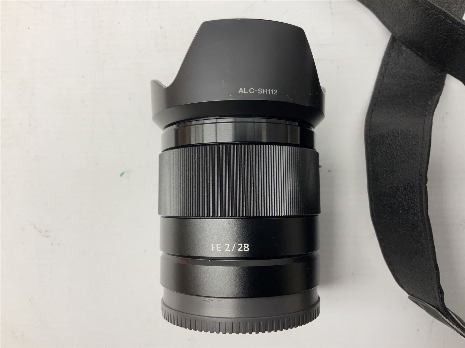 Sony Alpha 7R ILCE-7R camera serial number 3985636, with a 'Carl Zeiss Sonnar FE 1.8/55 ZA' lens, 'FE 28mm F2' lens, Sony Handycam Cyber-Shot HVL-F43M, all with original boxes, together with a Manfrotto camera bag  