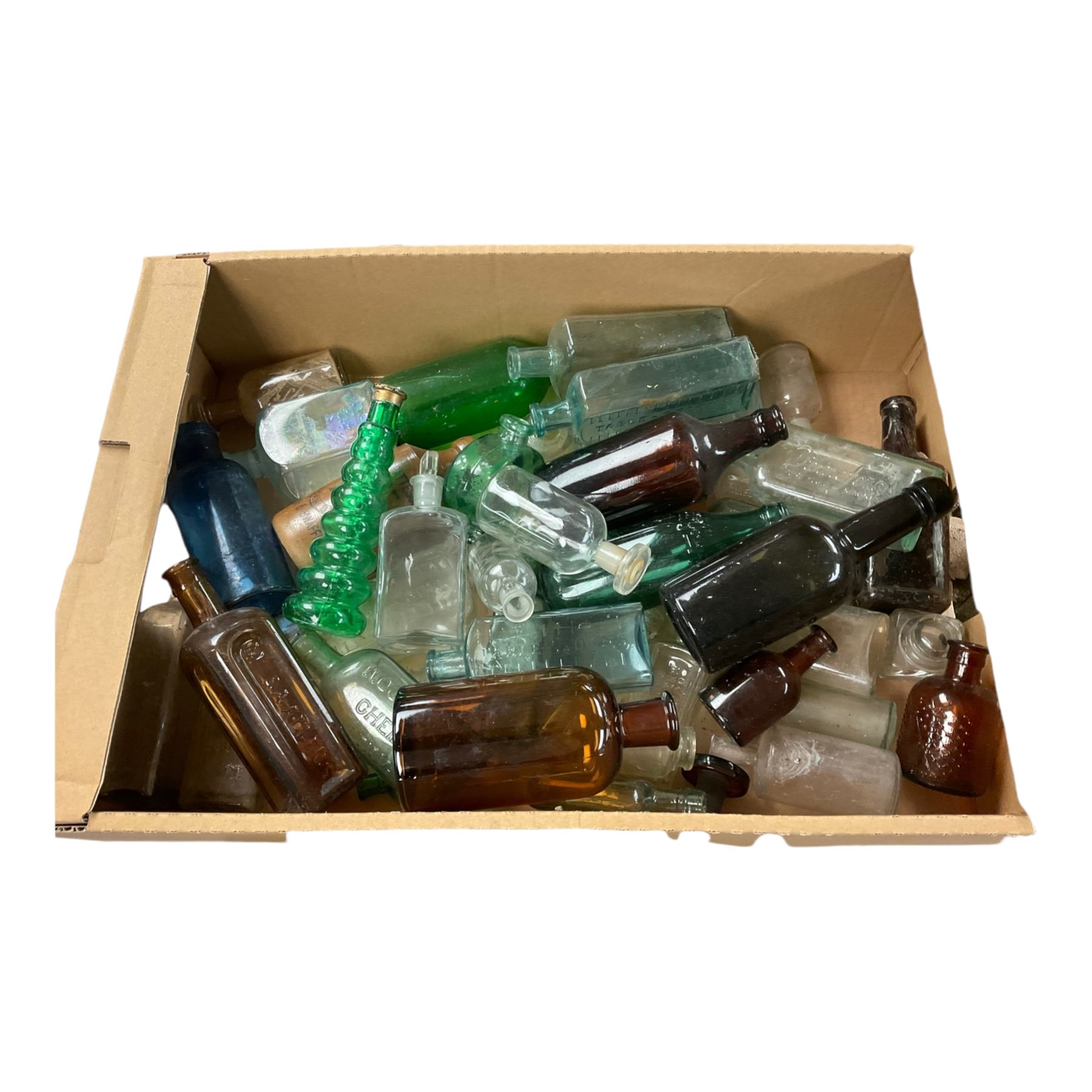 Five Schweppes soda water bottles, together with other vintage glass bottles 