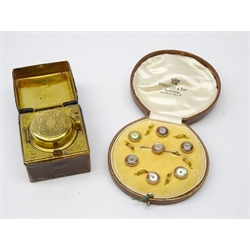  Cased mother-of-pearl dress studs retailed by Wheatley & Sons and Victorian leather bound and brass travelling inkwell (2)  