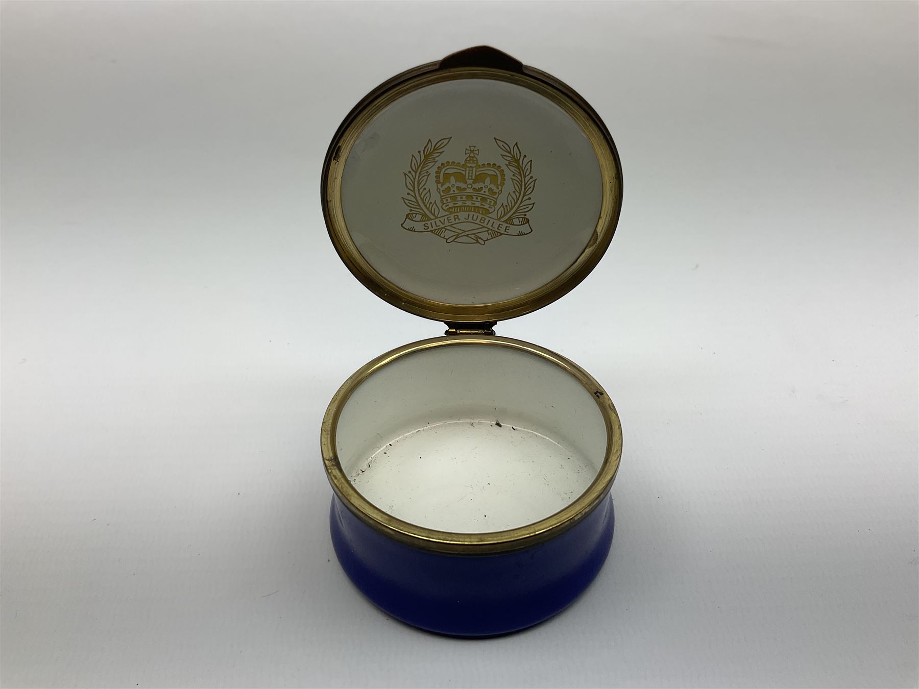 Cylindrical music box with domed lid depicting the Music Room at Buckingham Palace and playing Mozart's 'Voi Che Sapete', limited edition 187 of 250, boxed, together with enamel box for the silver jubilee and a victorian paperweight of Scarbrough  