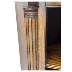 Late 20th century mahogany corner cabinet, dentil moulded cornice above a glazed door with astragal glazing enclosing two shelves, lower cupboard with fielded panel door and turned shell motif, on plinth base