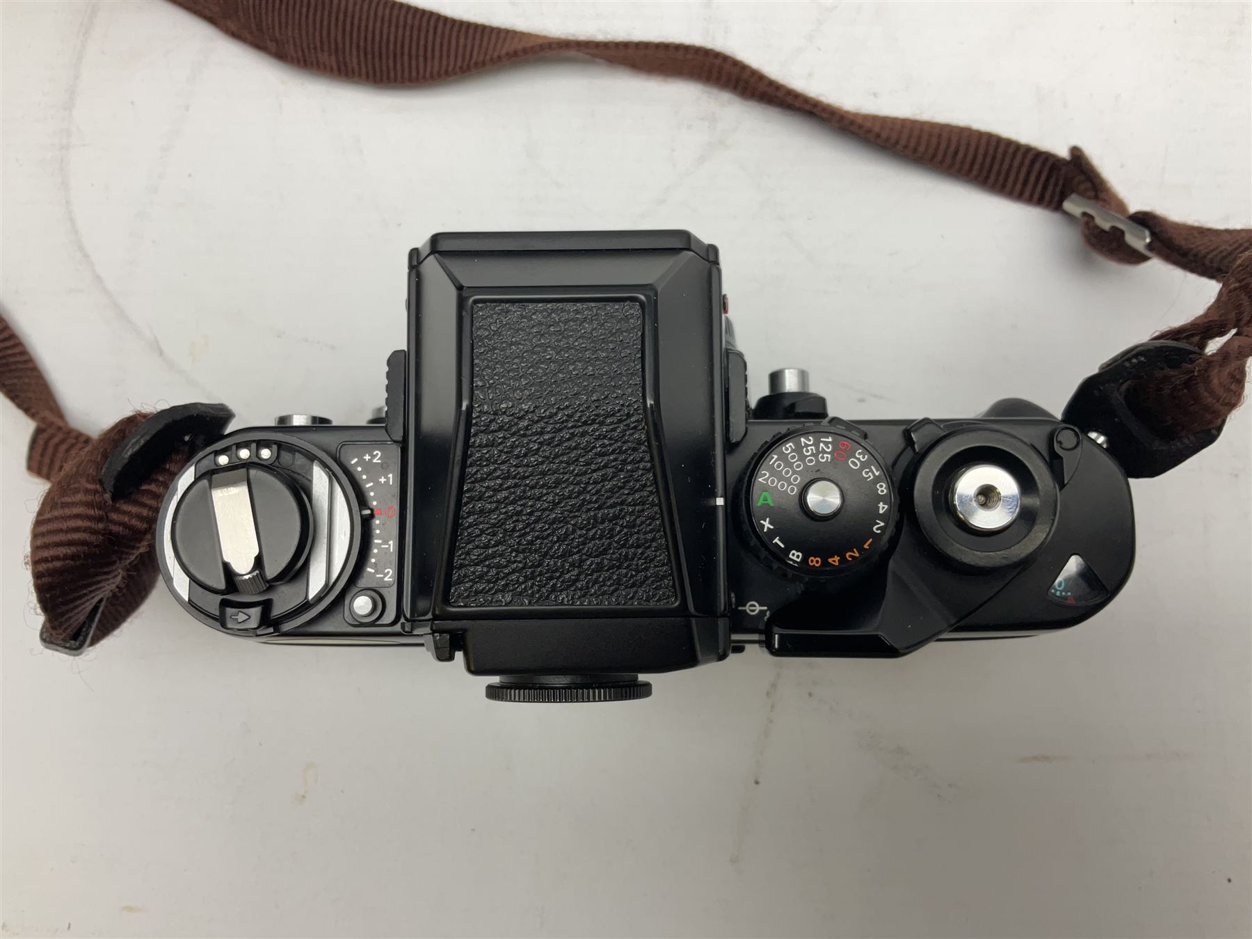 Nikon F3 SLR camera, serial number 1583609; Nikon 50mm 1:1.8 lens; Nikon 28-85mm 1:3.5-4.5 zoom lens; Vivitar MC 2X-3 Tele Converter, and a Nikon Speedlight SB-16 flash