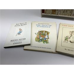 'Peter Rabbit's Book Shelf', containing selection of Beatrix Potter books, mostly library editions, shelf H29cm L27.5cm D11.5cm