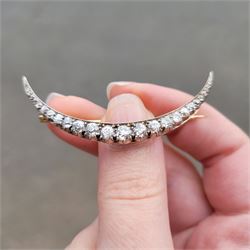 19th century silver and gold diamond crescent moon brooch, set with twenty-one graduating old cut diamonds and six rose cut diamonds, total diamond weight approx 2.00 carat