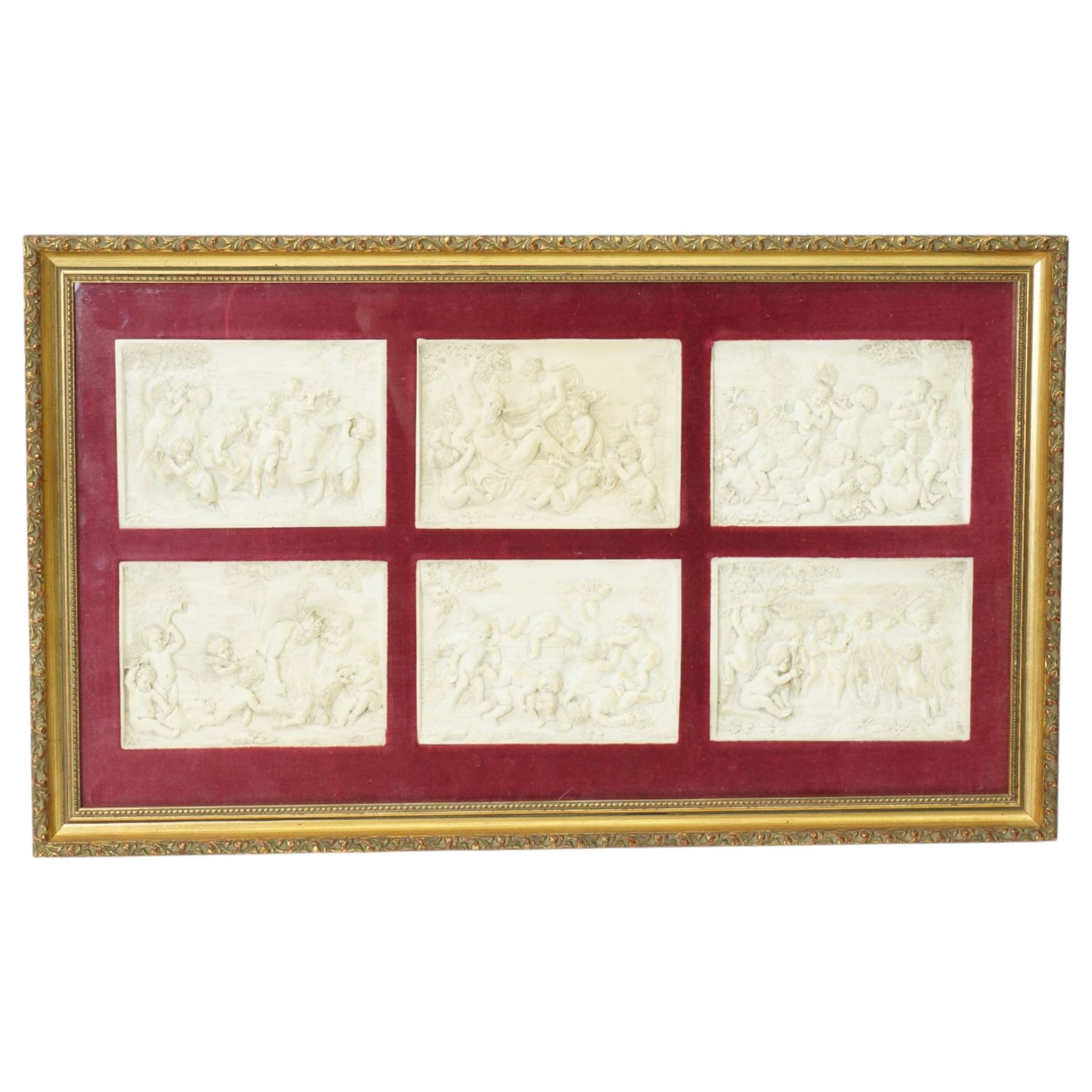 Set of six 19th century relief moulded plaster plaques depicting cherubs, possibly from the Mintons Museum and formerly from the estate of a Mintons artist each 11cm x 15cm in one frame