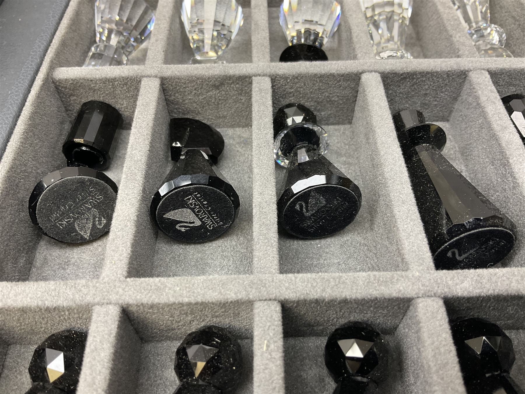 Swarovski silver crystal cut glass chess set, with clear and black pieces on mirrored board, in original presentation box 