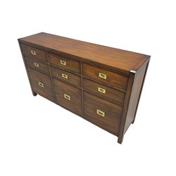 Cherrywood military style sideboard chest, fitted with nine drawers with recessed brass handles