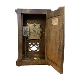 German-HAC oak cased 8-day mantle clock striking the hours on a gong. c1910. With key and pendulum.