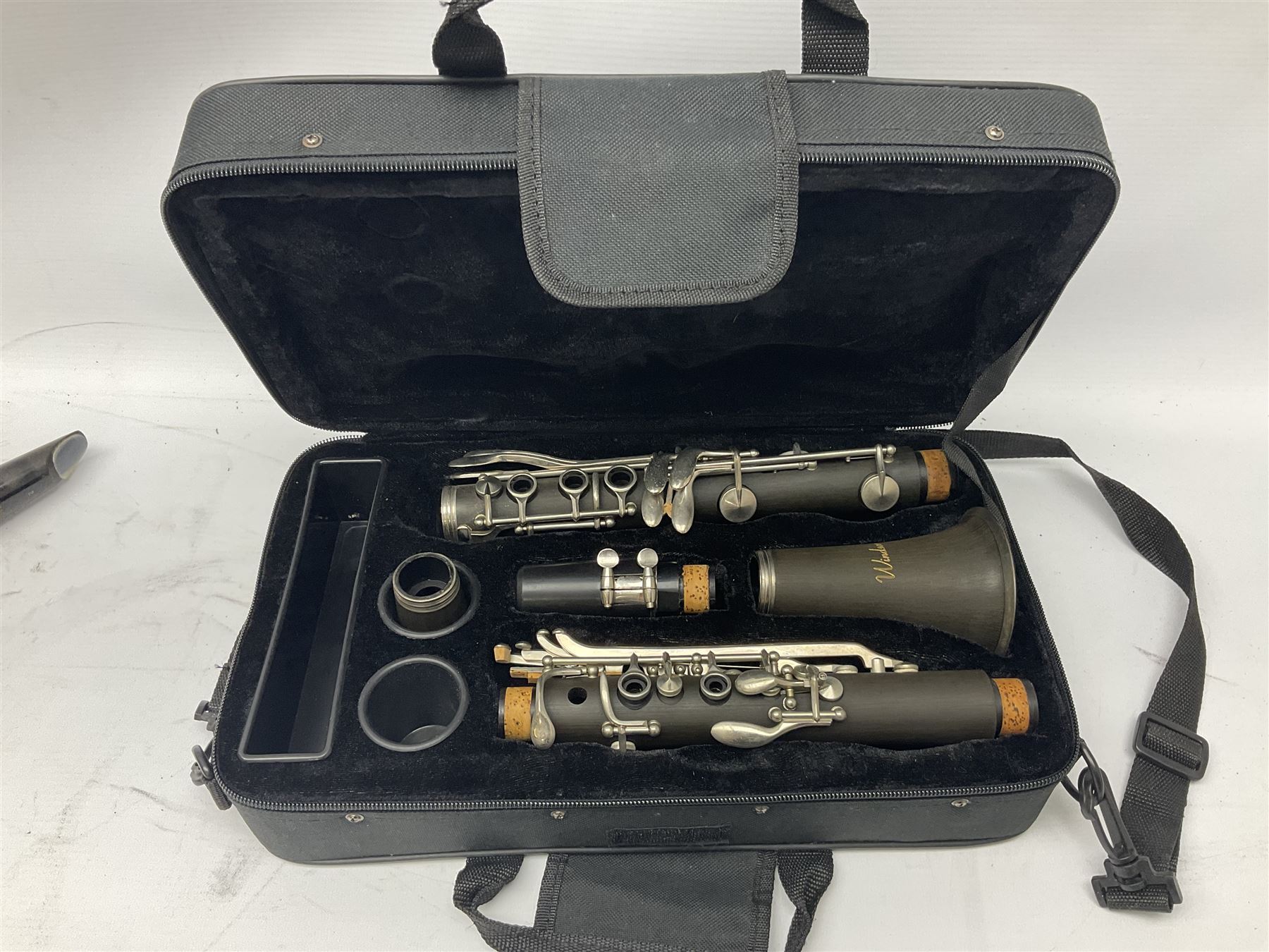 Windsor five-piece clarinet, serial no.EK05580; and Selmer Console clarinet with B&H mouth-piece; both cased (2)