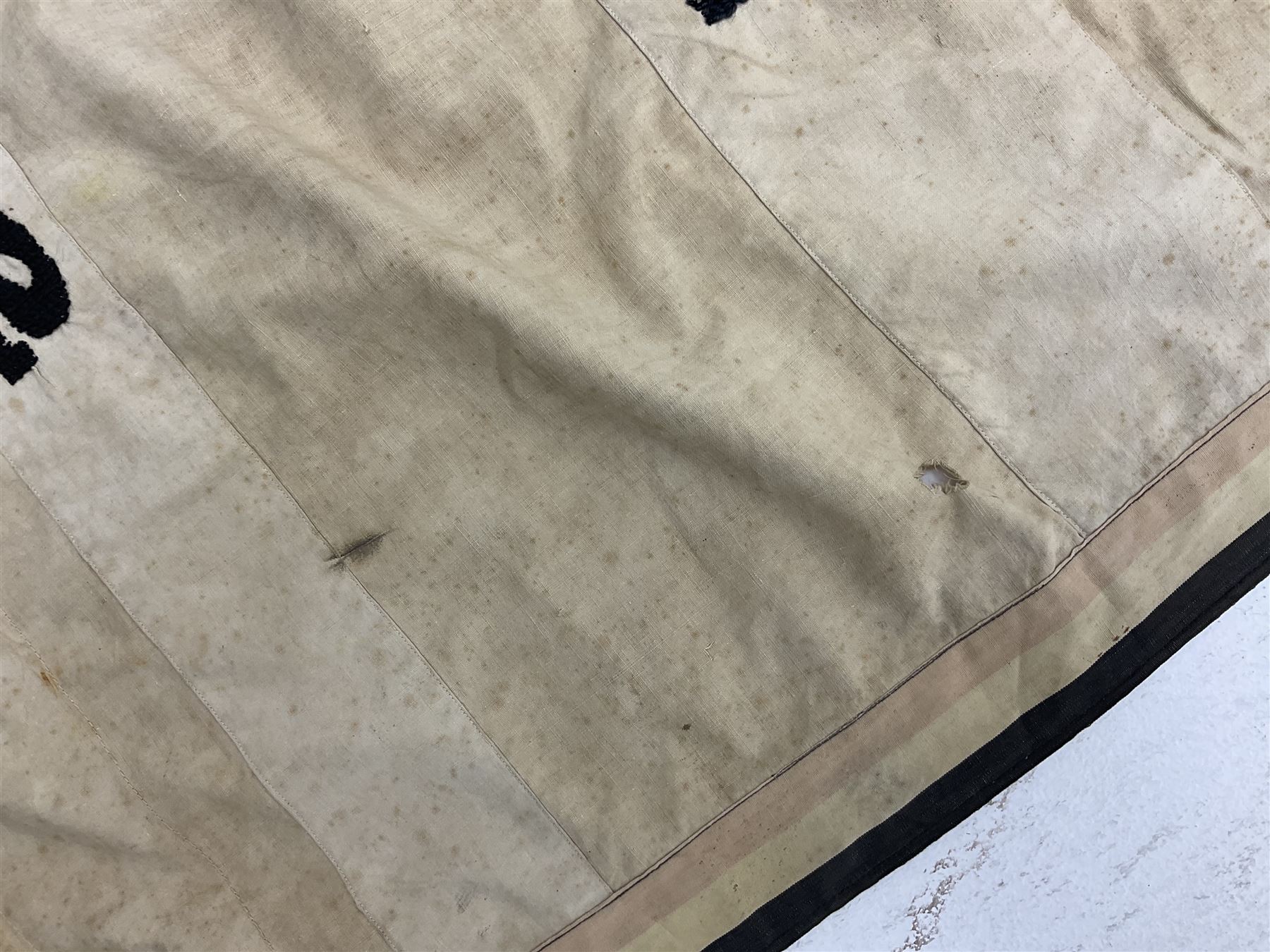 WW2 Belgian Partisan/Resistance two-sided banner embroidered in black on a cream ground 'Belgische Partisanen Korps 032 afd: Ph: De Bruyne' within a Belgian flag border; on wooden pole with gilded metal lion and laurel wreath finial