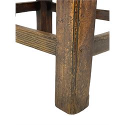 20th century mahogany rectangular footstool, needlework upholstered drop-in seat, on ball and claw carved feet (W81cm, D35cm, H34cm); 19th century elm stool, needlework upholstered drop-in seat, on square moulded supports united by plain stretchers (W45cm); 19th century walnut stool, shaped top upholstered in needlework, on cabriole supports (W50cm); 19th century rosewood stool, upholstered drop-in seat, on curved x-framed supports united by turned stretcher (W47cm)