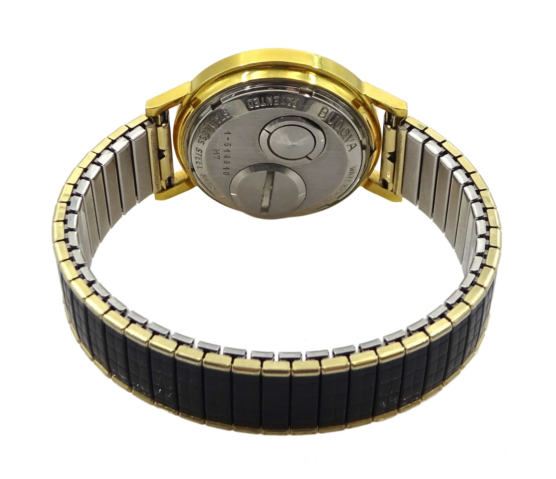 Bulova Accutron gold-plated and stainless steel gentleman's quartz wristwatch, No. 1-514910 M7, hands adjusted from the back, on expanding strap