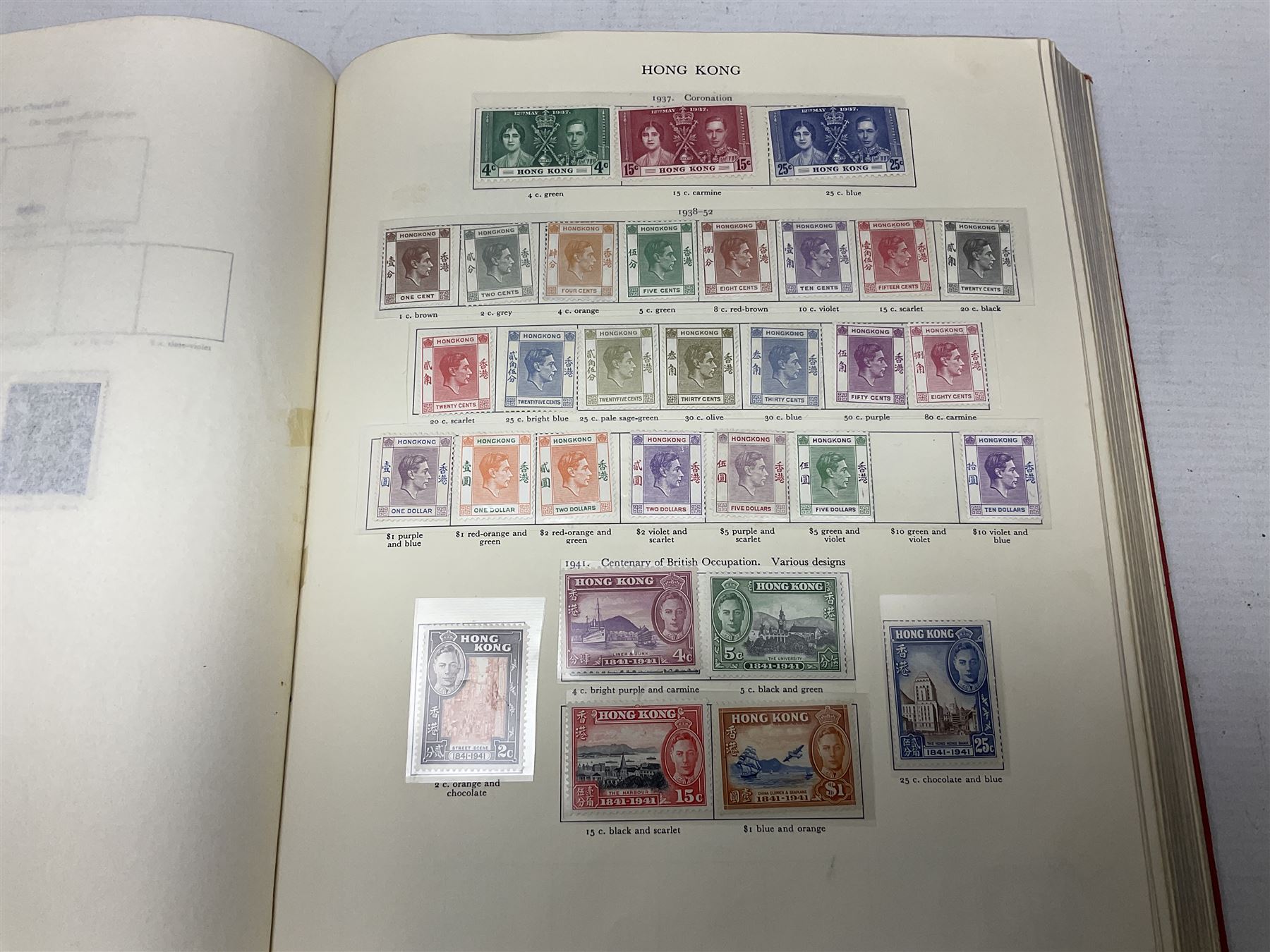 Single album collection of King George VI stamps, including Aden, Antigua, Ascension, Australia, Bahamas, Bahrain, Barbados, Basutoland, Bechuanaland, Bermuda, British Solomon Islands, Brunei, Burma, Cayman Islands, Dominica, Falkland Islands, Gambia, Gilbert and Ellice Islands, Gold Coast, Great Britain 1939-48 set to one pound including ten shilling dark blue, Grenada, Hong Kong, India, Ireland, Jamaica, Leeward Islands, Malta, Mauritius, New Zealand etc