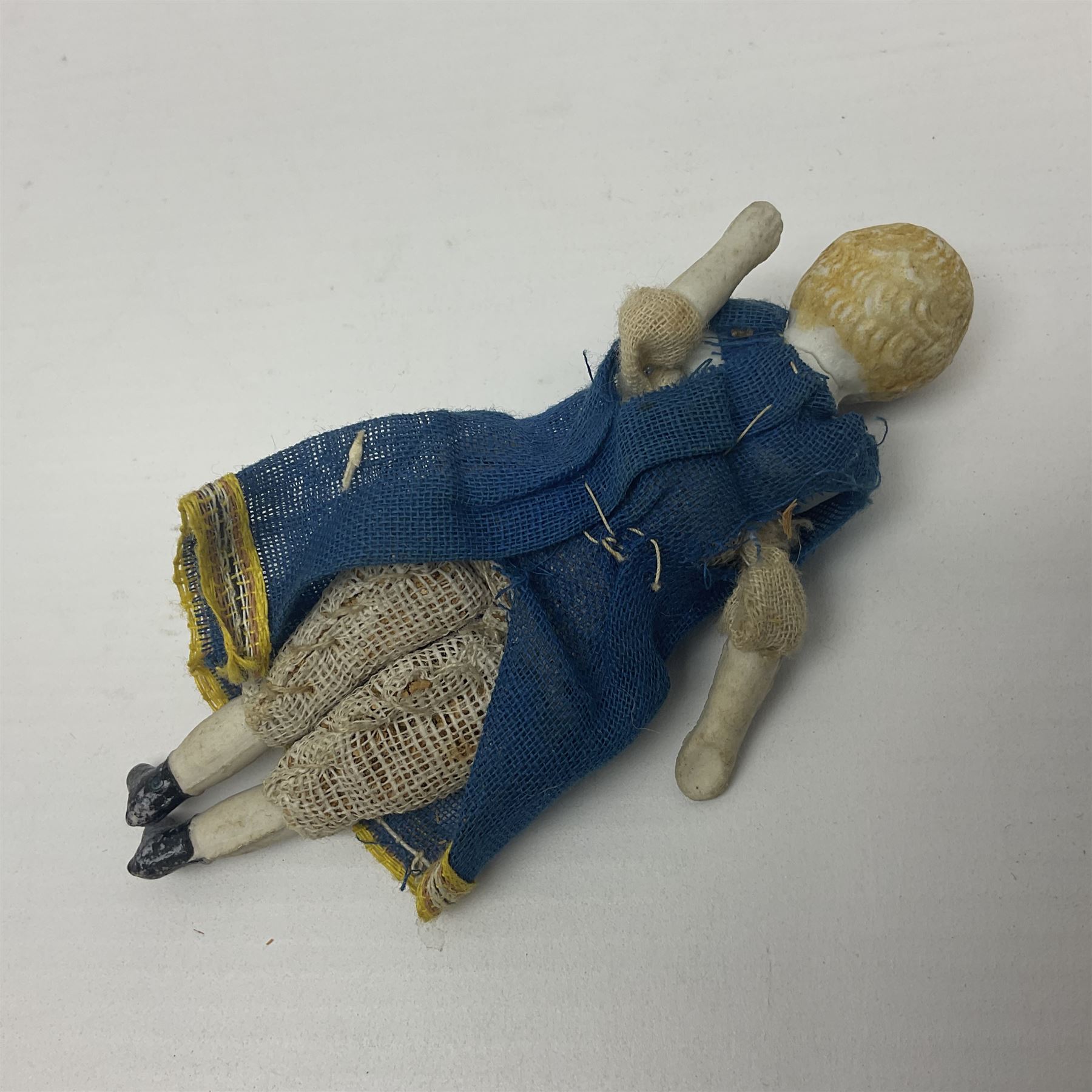 Twelve miniature bisque, bisque headed and wooden dolls to include articulated examples, tallest 12cm 