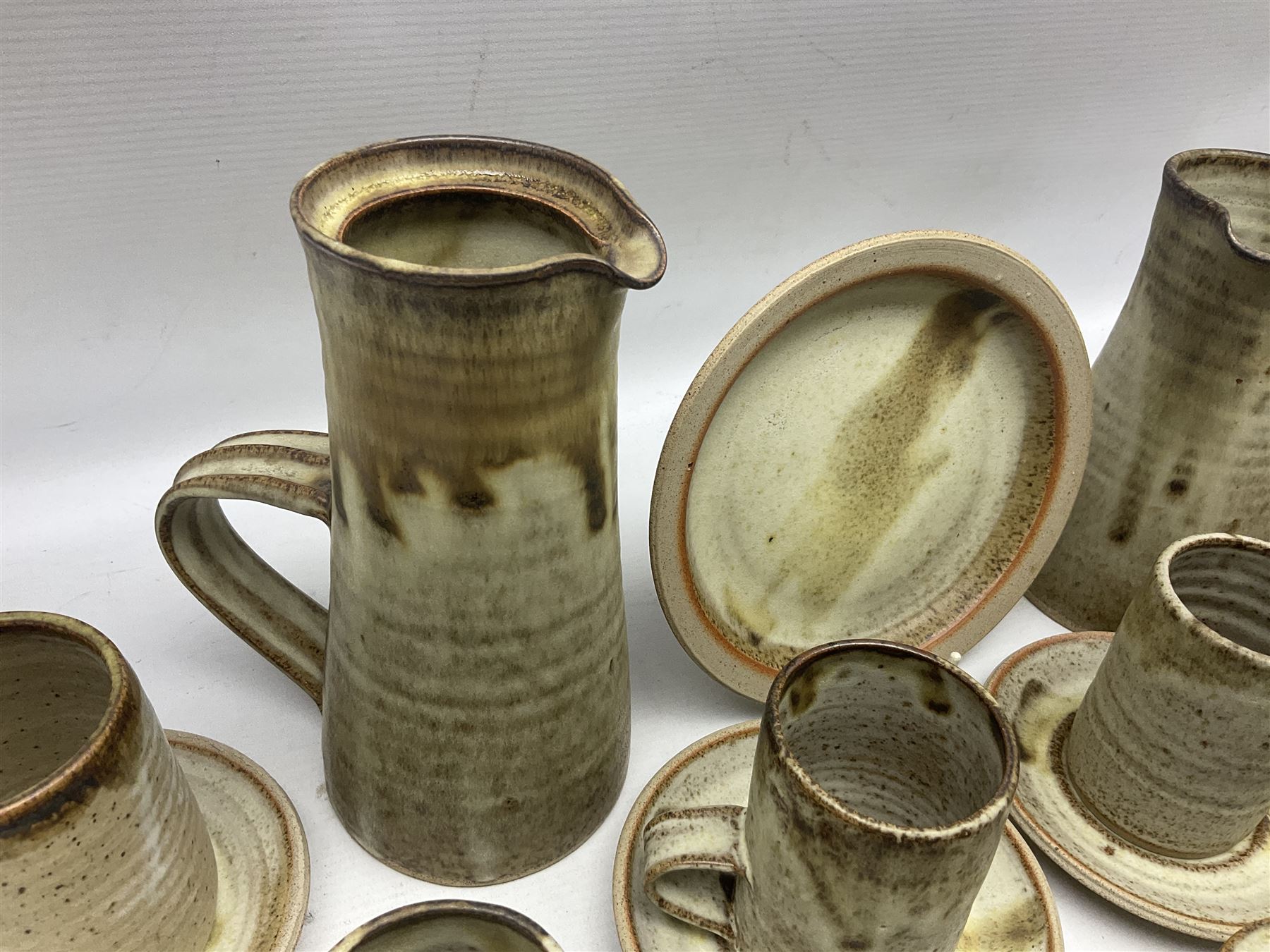 1970s Anchor studio pottery St Ives part coffee service by John Buchanan, all with various impressed anchor, St Ives and other marks, together with similar set of six studio pottery cups with impressed RP monogram