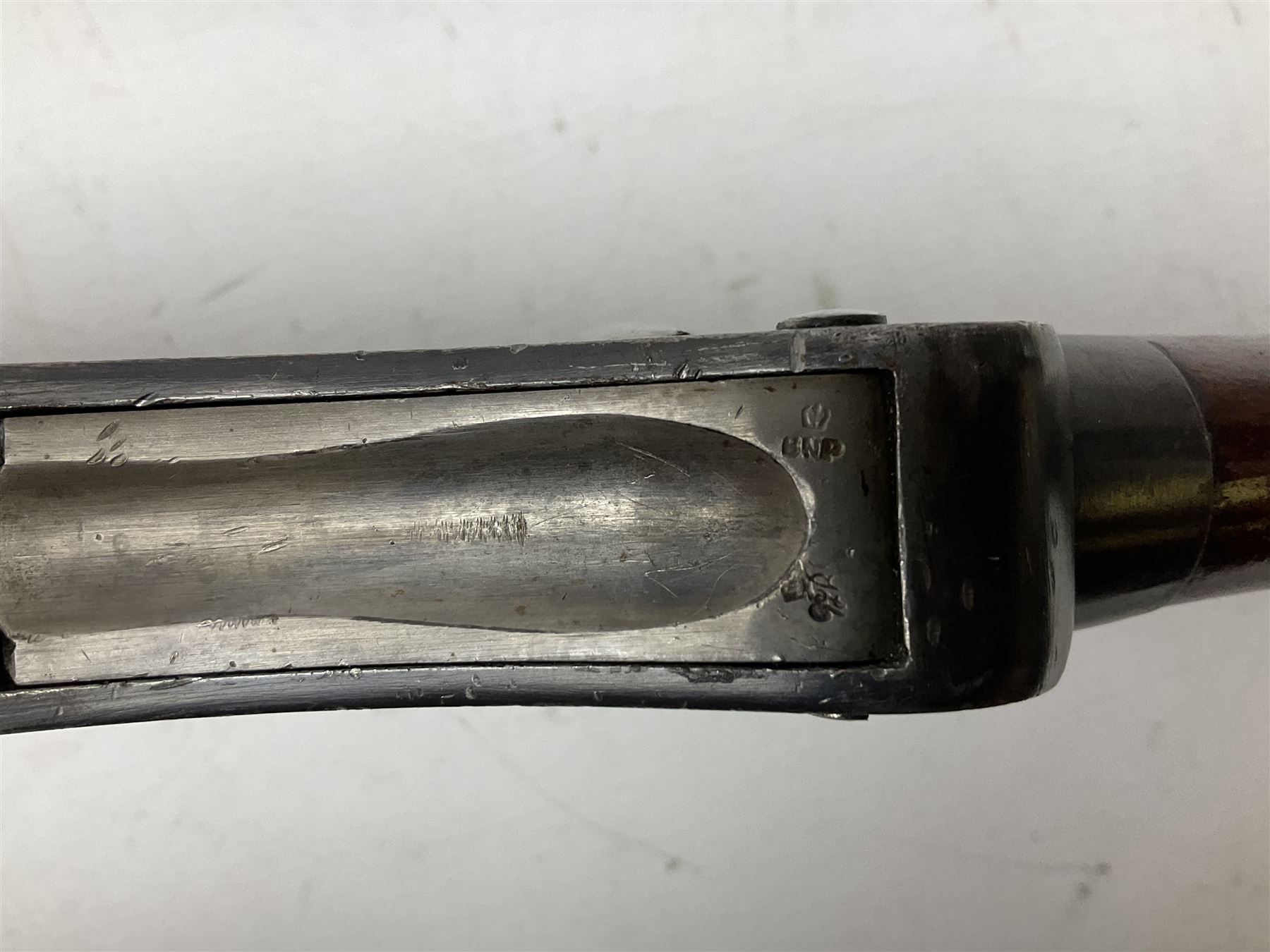 Westley Richards .310 Cadet Martini action rifle, the 63.5cm smooth bored barrel with one barrel band, walnut stock stamped 93/352 with hinged compartment to butt, serial no.3365, L103cm