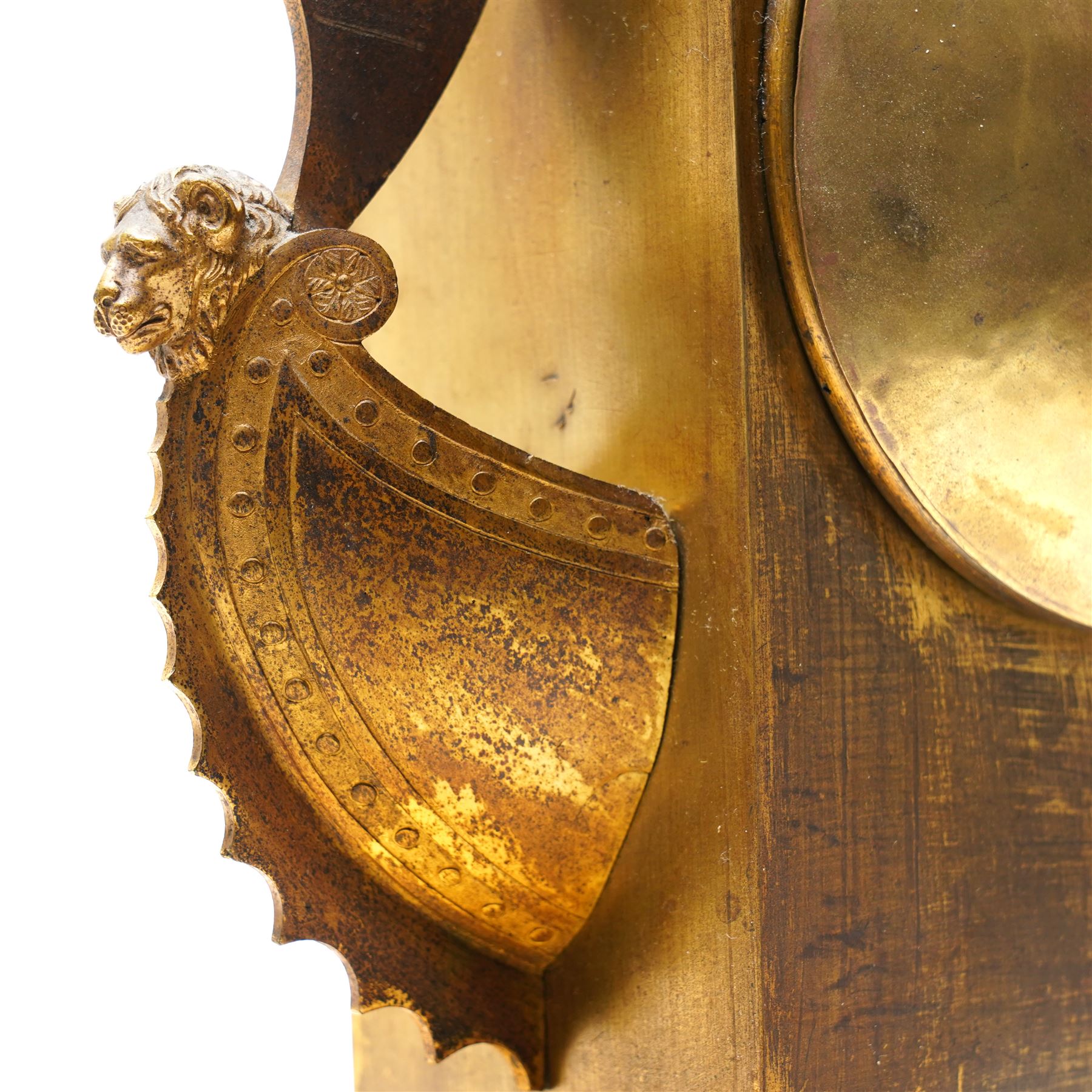 Empire period-gilt brass early 19th century French figural mantel clock c1820, the case surmounted with a figure of Ceres the Roman goddess of plenty holding a cornucopia overflowing with fruit and corn, supported on a rectangular plinth base with depictions of putti representing the arts and labour, movement case with floral garlands and a leaf and ribbon dial bezel, convex white enamel dial with moon hands and short Roman numerals, with a  Parisian 8-day twin-train countwheel striking movement and silk suspension, striking the hours and half-hours on a bell.
With pendulum and key. 