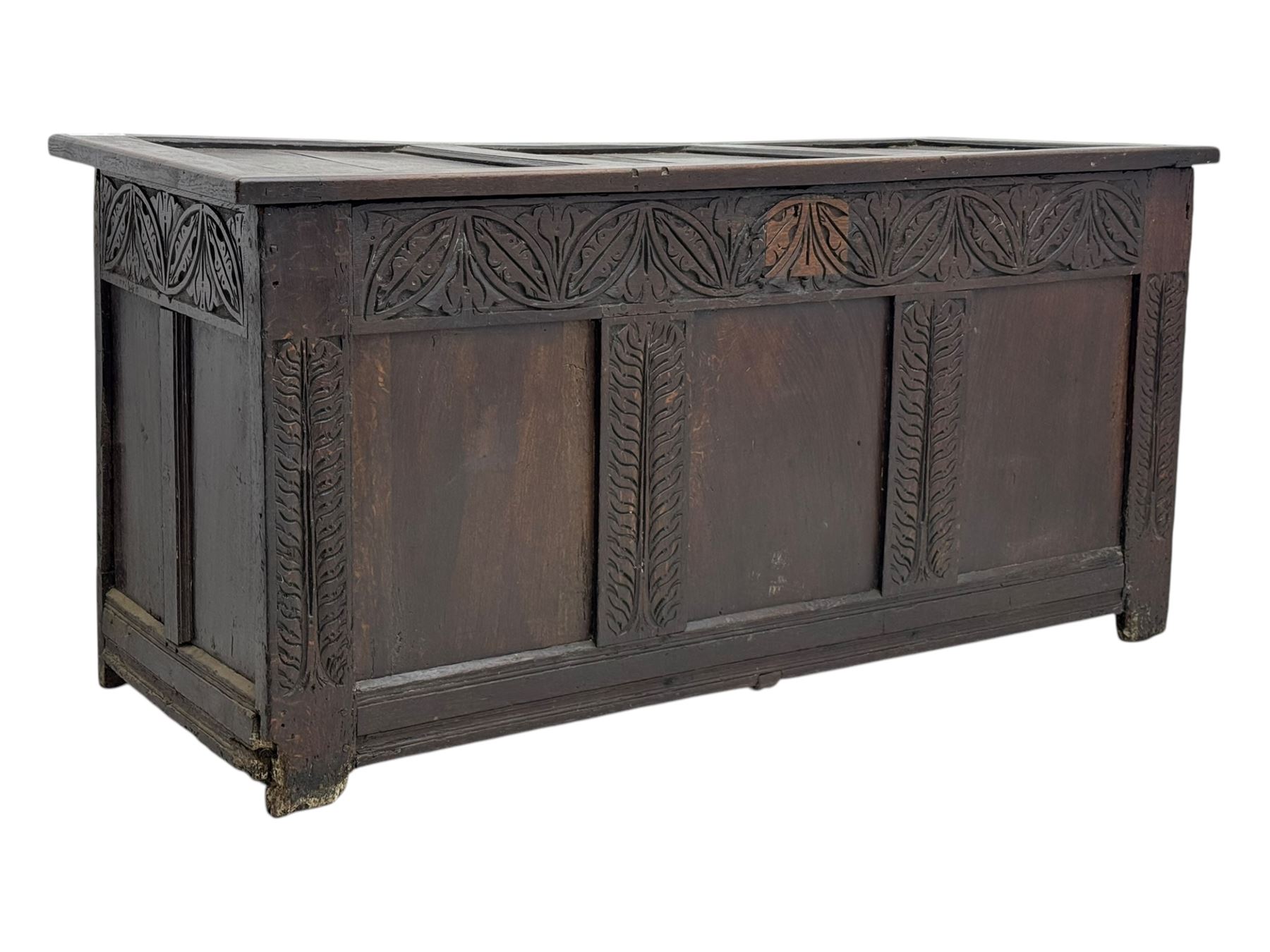18th-century carved oak blanket chest with hand-carved floral and leaf motifs 
