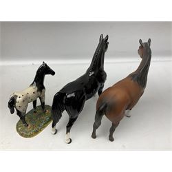 Collection of Beswick horse figures, to include Red Rum on a wooden plinth,  Lammtarra on oval plinth, Morgan Horse Black and three others, together with Royal Daulton Appaloosa Foal and a USSR horse
