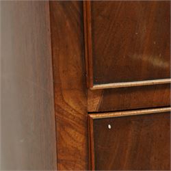 19th century mahogany chest of drawers, bow fronted form with two short over three long drawers, each veneered in matched flame mahogany, on turned feet