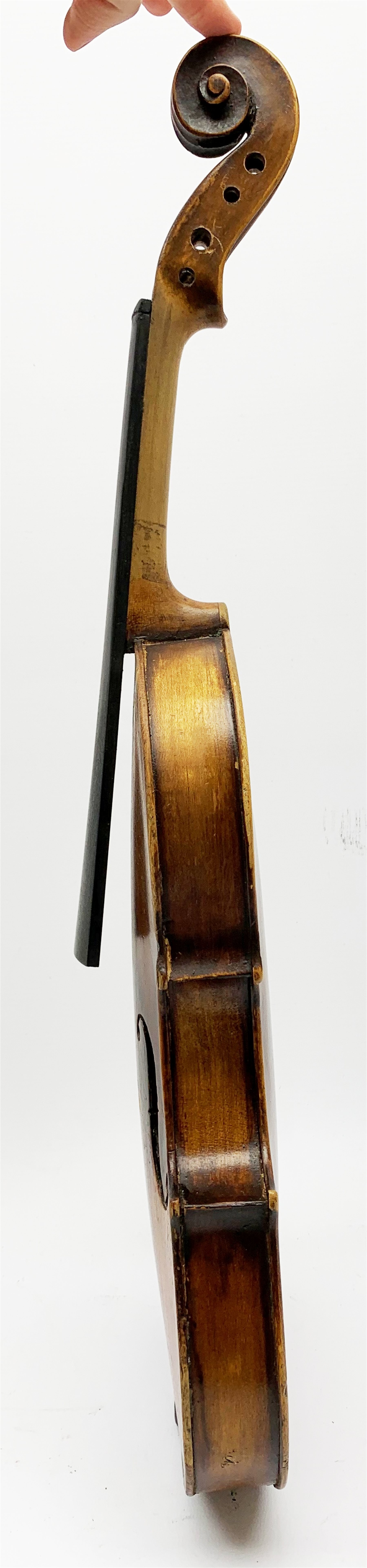  Late 19th century German violin for completion with 36cm one-piece maple back and ribs and spruce top, bears label Copie De Albani Palermo 1633, 59cm overall together with three books on violin construction, restoration and varnishing  