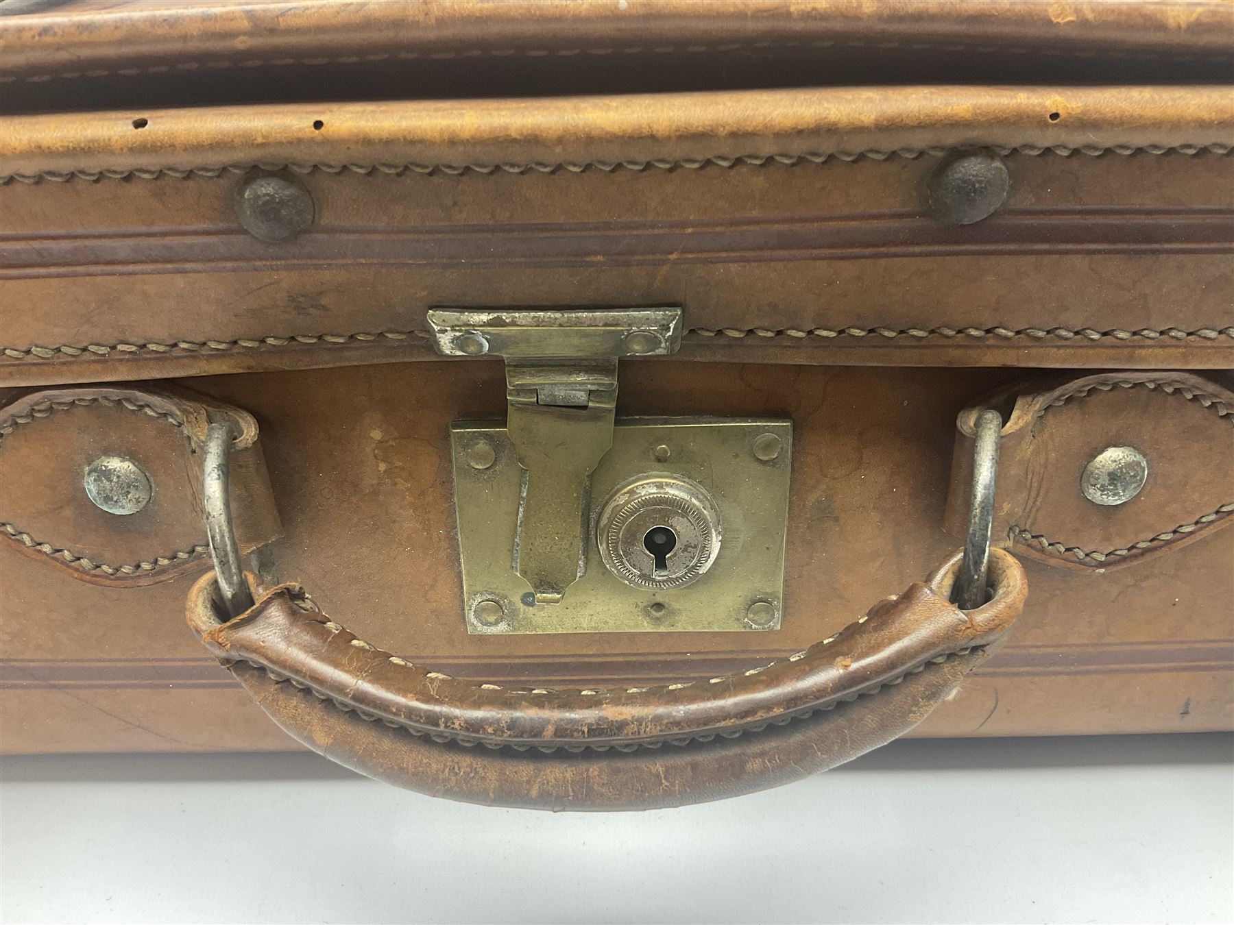 Late 19th/early 20th century stitched and studded leather portmanteau type suitcase with expanding lid and straps, L61cm