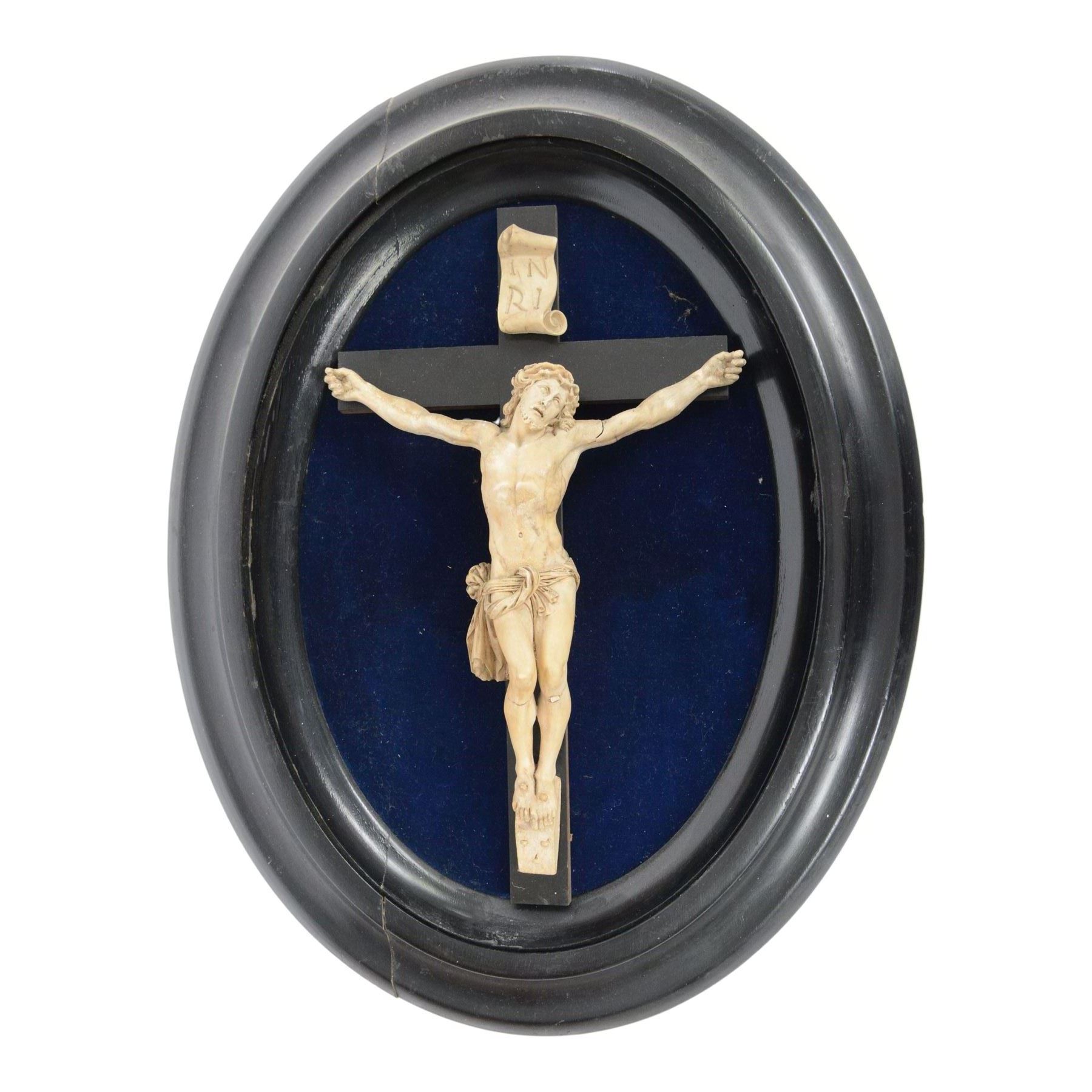 Eight crucifixes with Corpus Christi, various ages and materials, including wood and medal examples, largest H120cm 