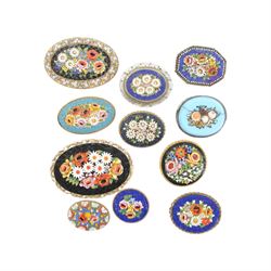 Nineteen micro mosaic brooches, all decorated all with floral decoration to the centre
