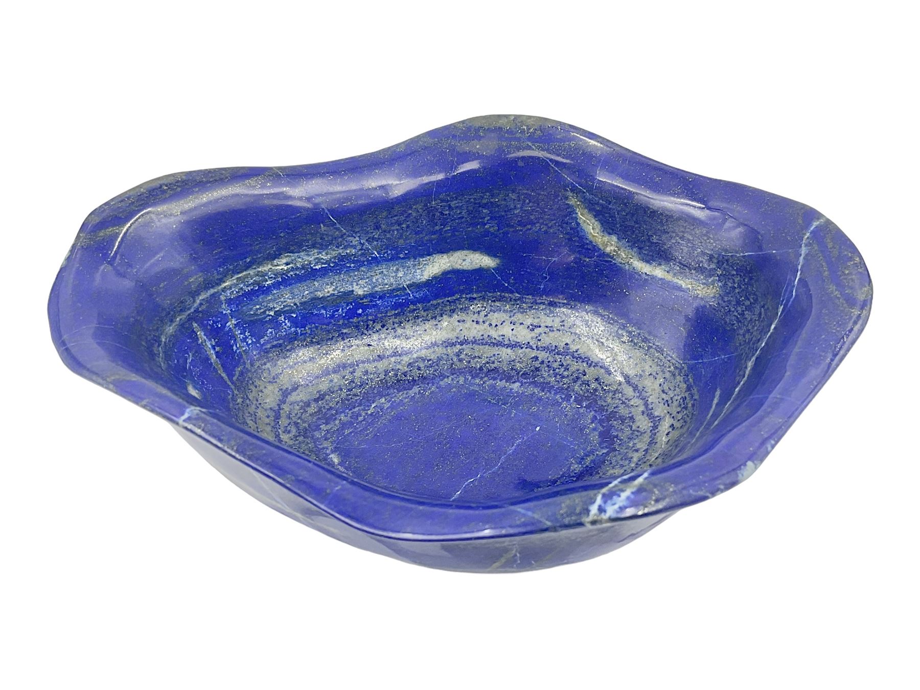 Carved bowl, flat-bottomed bowl carved from a single piece of Lapis lazuli with flared rim, H8cm, L21cm